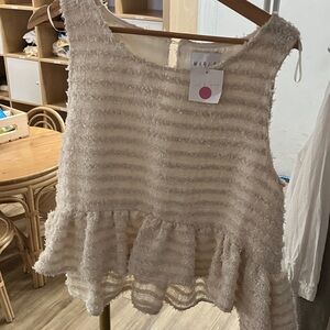 Jana top
MARIE Ivory Textured Peplum Tank Top